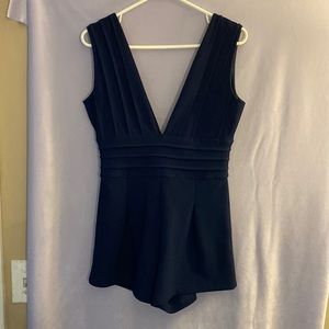 Rare London womens size medium low cut body suit